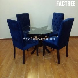 blue velvet fabric charis with round dinning table and glass top