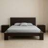 wooden curved bed