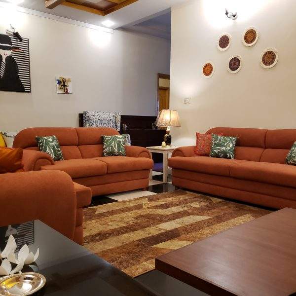 rust-cloud-sofa-living-room-setup.webp Rust cloud sofa styled in living room