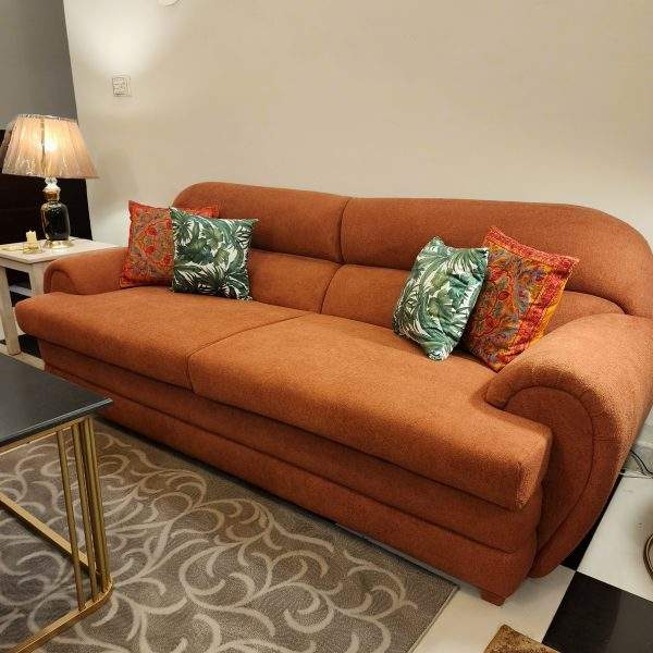 rust-cloud-sofa-texture-closeup.webp Rust cloud sofa side angle cloud design