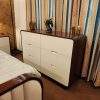 Cohesive-bedroom-furniture-set-including-curved-Sheesham-bed-six-drawer-dresser-and-matching-radius-corner-side-tables