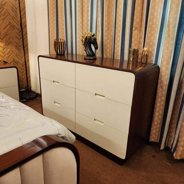 Cohesive-bedroom-furniture-set-including-curved-Sheesham-bed-six-drawer-dresser-and-matching-radius-corner-side-tables