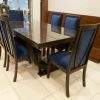 Solid Sheesham wooden dining table set with six upholstered chairs in Pakistan