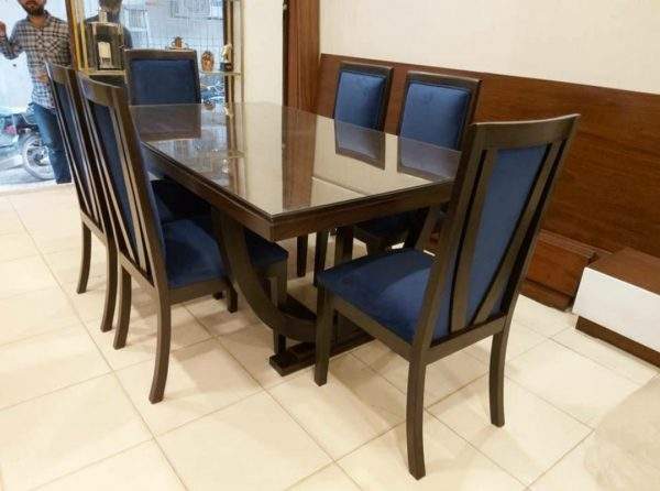 Solid Sheesham wooden dining table set with six upholstered chairs in Pakistan