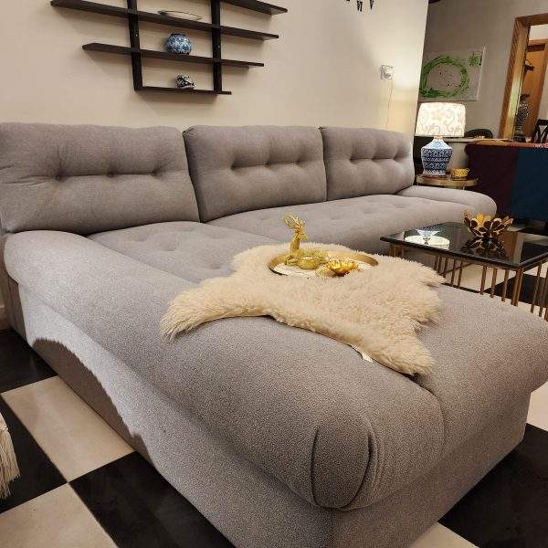 Oversized L-shaped Cloud sectional sofa styled for a contemporary living room.