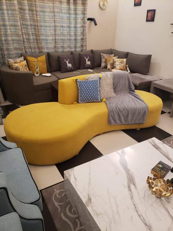 8 ft Cika curved couch with almost four person seating capacity