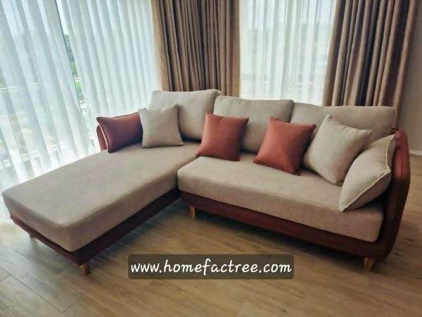 Minimal sectional sofa with charcoal cushions and wooden frame